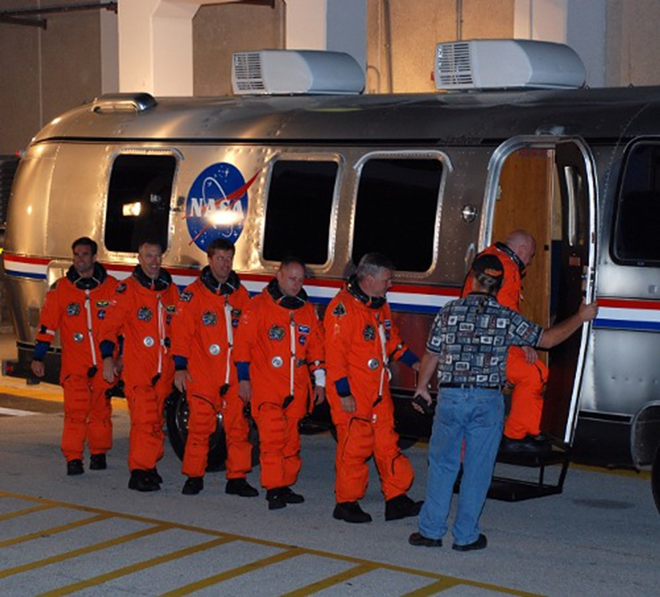 Crew of shuttle Endeavour enter transport vehicle for the ride out to the launch pad - www.starznbarz.com