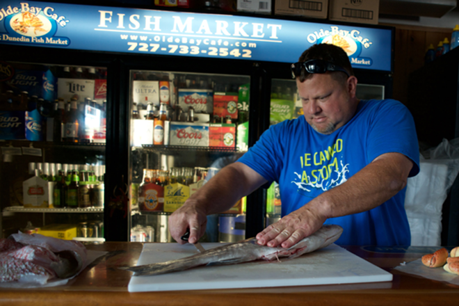 Chef and owner Walt Wickman filets a fresh catch. - Kevin Tighe