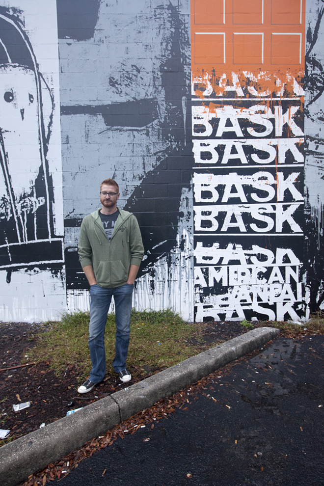 Bask in front of one of the 19 sections of his mural located on the 600 block in Downtown St. Pete. - Nicole Abbett