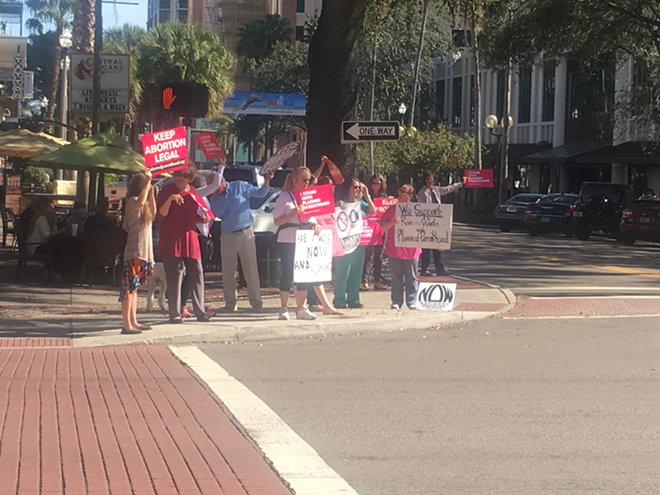 Dozens gather in downtown St. Pete to mark Roe v. Wade anniversary