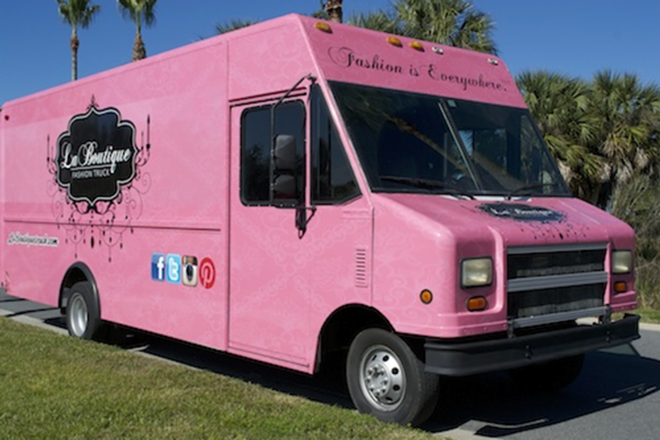 BIG PINK: La Boutique Fashion Truck attracts attention wherever it goes, and lures shoppers with one-of-a-kind accessories and a parlor-style interior. - Leslie Joy Ickowitz