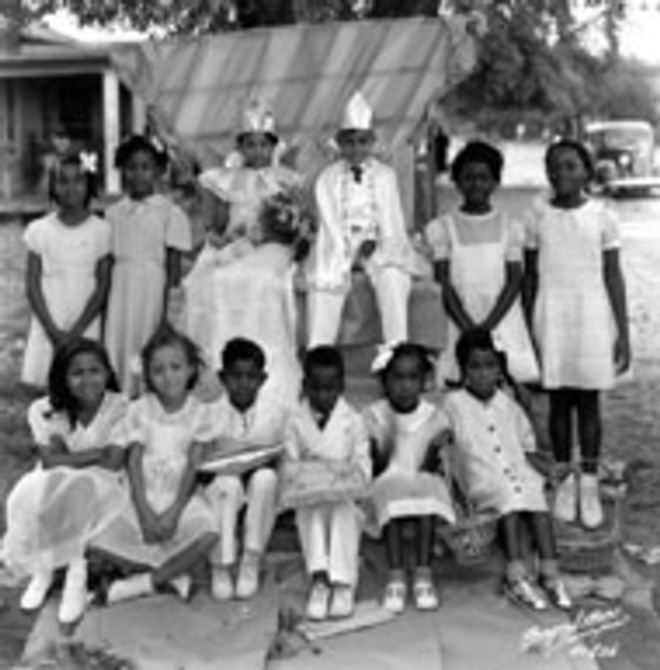 WHO ARE THEY? This photo of children at the - Dobyville school at 307 Dakota St., Tampa, was taken - May 3, 1937. The school has been demolished. - Ty Library