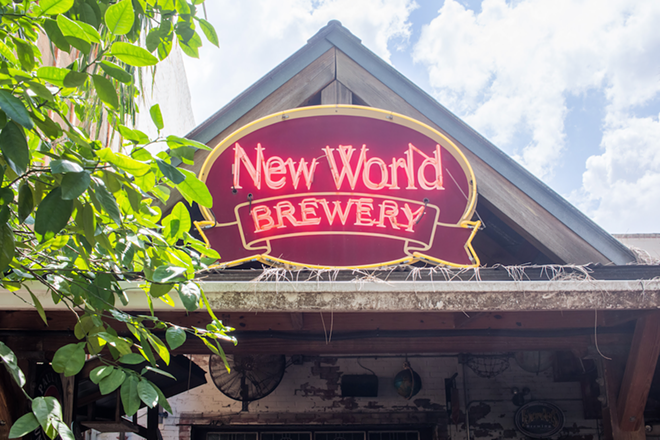 The sign at New World Brewery’s Ybor City location, which closed in 2017 to make way for apartments. - PHOTO BY ANTHONY MARTINO