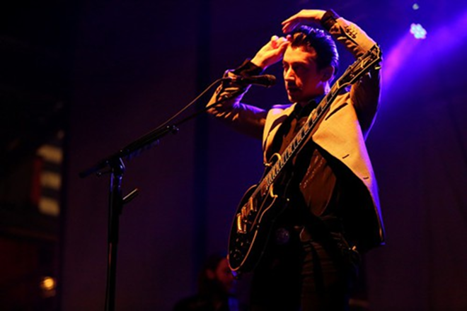 Arctic Monkeys' Alex Turner pauses for a quick spruce up. - Drunkcameraguy.com