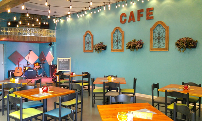 The cafe's stage serves as an outlet for its open-mic nights and After Dark live music series. - Meaghan Habuda