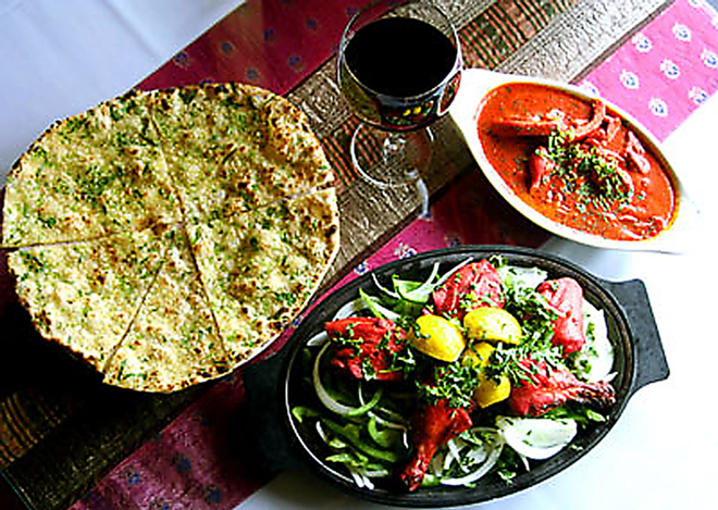 LAZIZ LOVE: Laziz Indian features Garlic naan, butter chicken and Tandoori chicken. - Shanna Gillette