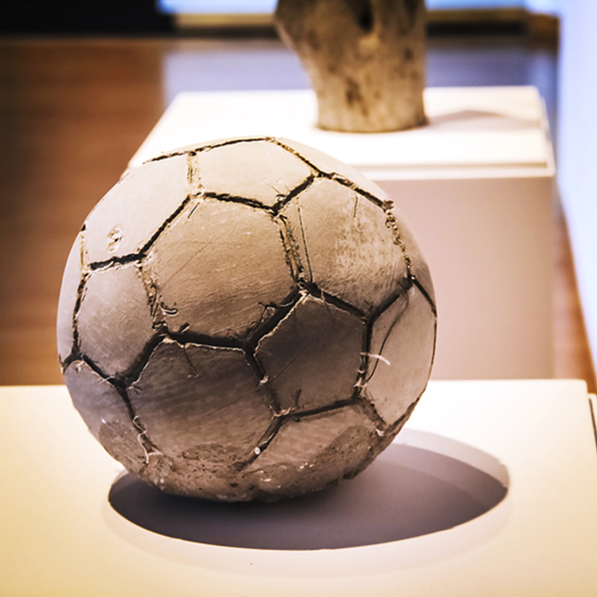 POLITICAL FOOTBALL: Khaled Jarrar's soccer ball made of olive branches and concrete. - Daniel Veintimilla
