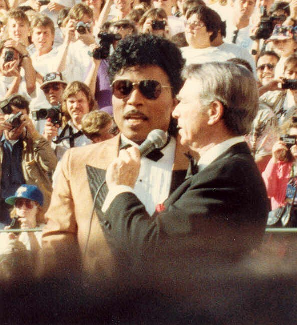 Little Richard being interviewed by Army Archerd on the red carpet at the 60th Annual Academy Awards. - photo by Alan Light : CC BY (https-::creativecommons.org:licenses:by:2.0)