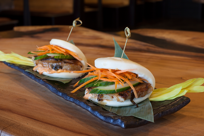 Among the EDGE District restaurant's tapas-style "izakaya plates" are a pair of pork belly buns. - Nicole Abbett