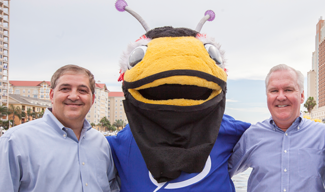 Vinik, left, and Tampa Mayor Bob Buckhorn pose with the Tampa Bay Lightning bug. - Nicole Abbett