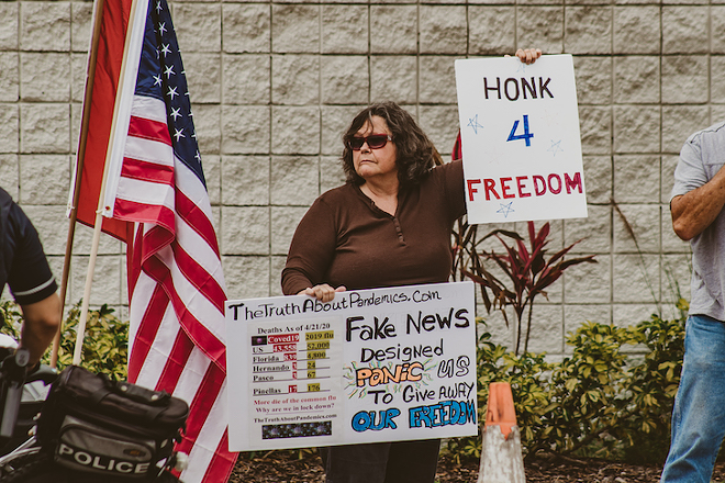 A protester at a re-open demonstration in Tampa, Florida on April 26, 2020. - Yvonne Gougelet