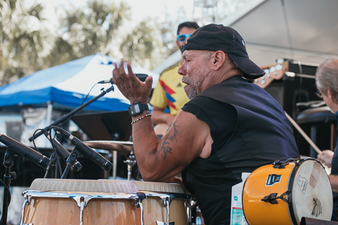 Gumbi Ortiz of The Black Honkeys Band, playing with the Clearwater Jazz All-Stars at Coachman Park. - Marlo Miller