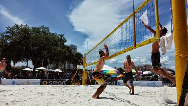 White sand from Clearwater Beach was trucked in to set up four courts on Spa Beach for the AVP St. Petersburg Open. - Chris Girandola