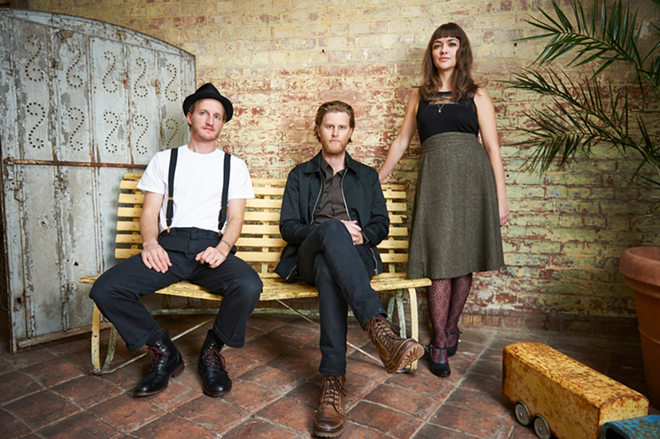 HOLDING ON TO THE MOMENT: The Lumineers’ Wesley Schultz (center) with bandmates Jeremiah Fraites and Neyla Pekarek. - BIG HASSLE