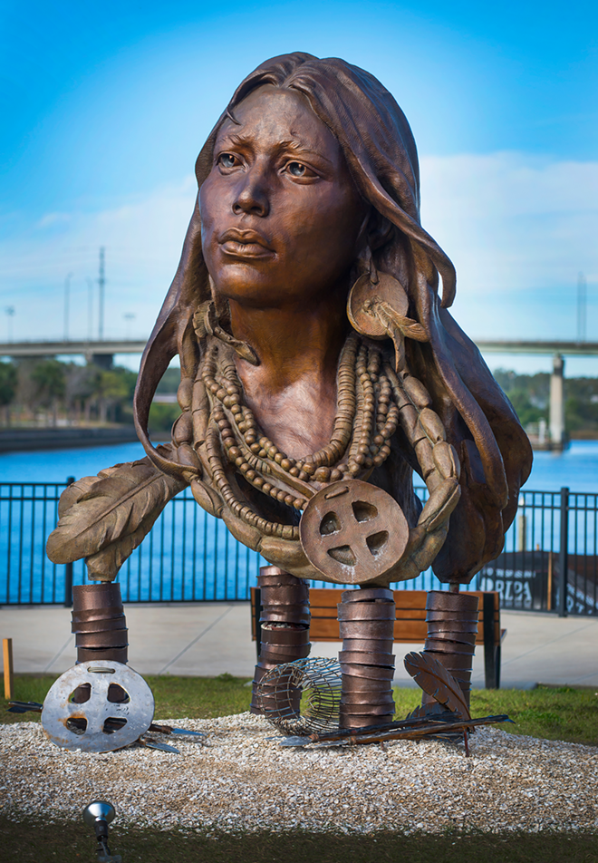Columbia President Richard Gonzmart commissioned the bronze statute from artist Vala Ola. - Ulele
