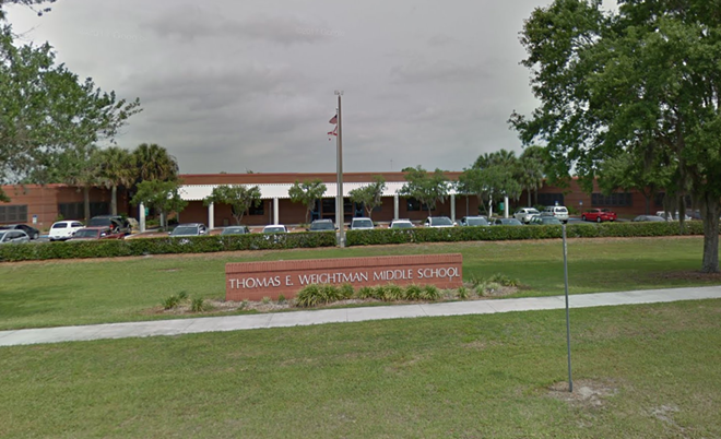 A deputy accidentally fired their gun into a cafeteria wall in a Pasco County middle school today