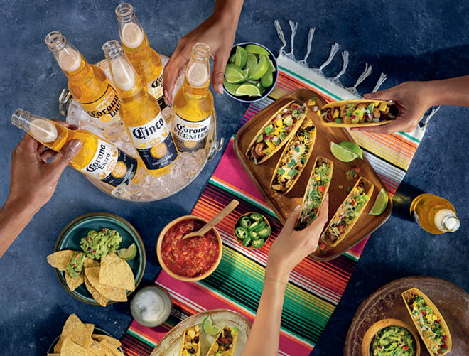Get your fiesta to go, and Cinco at home with Corona and tacos