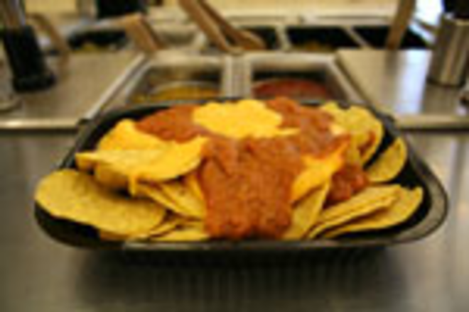 BUY NOW, PAY LATER: Nachos slathered in "free" chili and cheddar that stays liquid at room temperature. - Max Linsky