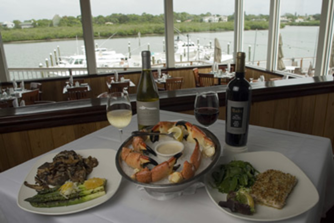 DINNER WITH A VIEW:(Left to right) Salt Rock Grill's Veal Porterhouse, Jumbo Stone Crab Claws and Macadamia Nut-Crusted Halibut. - Lisa Mauriello