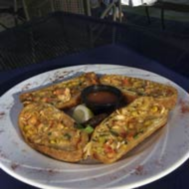 DINING ALFRESCO: Lobster egg rolls with jalapeno and mango sweet and sour sauce. - SHAWN JACOBSON