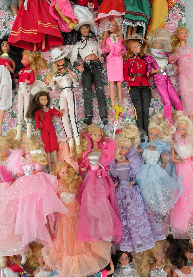 Jan Stenhouse, Wall of Barbies, 2016, photograph, 41 x 30 in. - Courtesy of the Morean Arts Center