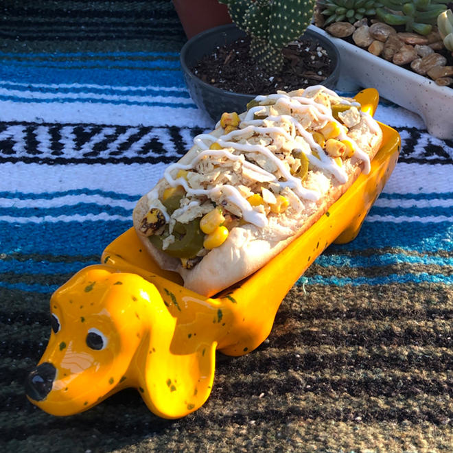 Nah Dogs’ Yo Soy Dog with vegan nacho cheese sauce, street corn salsa, jalapenos, crunched tortilla chips and garlic mayo. - Photo c/o Nah Dogs