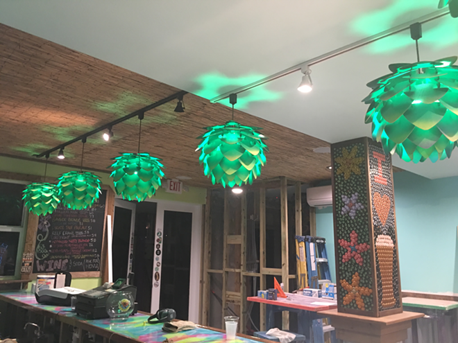 Are those... hops lamps? Note the bottle cap mural. - Cathy Salustri