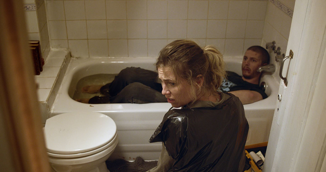 Becca (Jillian Harris) prepares to dismember her brother Richie (Heston Horwin) for the third time in "Dead Dicks" - Artsploitation Films