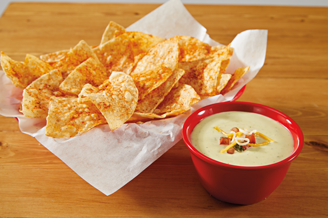 Fuzzy's Taco Shop now jazzes up its already-famous queso with jalapeño and cilantro on the daily. - Fuzzy's Taco Shop