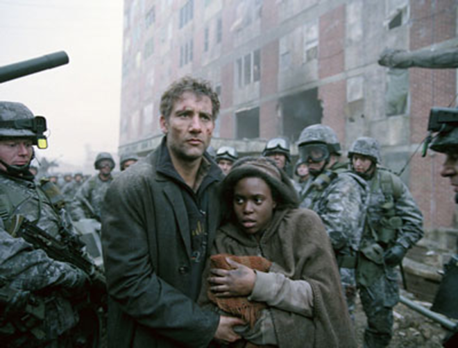 LAST HOPE: Theo (Clive Owen) tries to shelter Kee (Claire-Hope Ashitey) in Alfonso Cuarón's latest, Children of Men. - © 2006 Universal Pictures