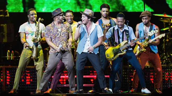NO CAMERAS ALLOWED: This recent stage shot resembles the sporty-casual attire Bruno Mars and band wore in Tampa on Aug. 28. - Getty