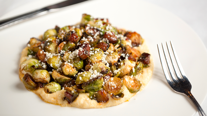 Apps include Brussels sprouts with bacon lardon, sweet chili garlic, creamy polenta and cotija cheese. - Chip Weiner