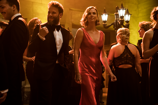 Seth Rogen, left, and Charlize Theron make for a perfect date-night pairing in Long Shot, a truly funny, seriously raunchy, comedy. - Murray Close/Lionsgate