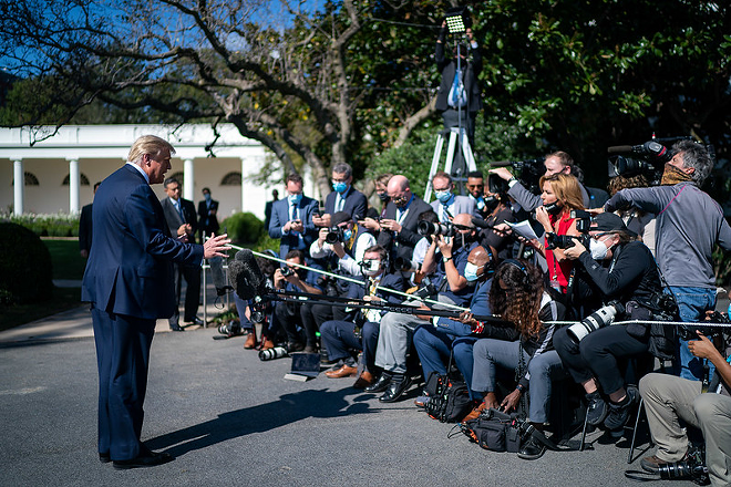 Donald Trump talks to members of the press along the South Lawn driveway of the White House Wednesday, Sept. 30, 2020, prior to boarding Marine One en route to Joint Base Andrews, Md. to begin his trip to Minnesota. - Tia  Dufour
