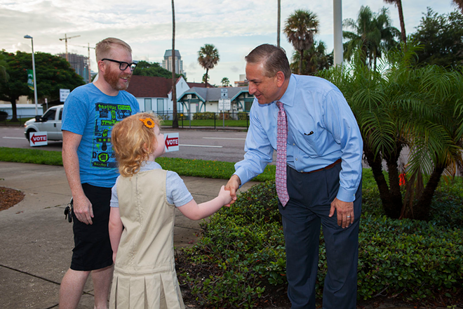 ELECTIONEERING TILL THE END: The current mayor meets a future voter on Election Day. - Kimberly DeFalco