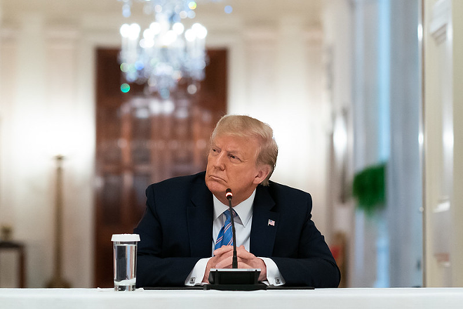 President Donald J. Trump listens to participants deliver remarks during the National Dialog on Safely Reopening America's Schools event Tuesday, July 7, 2020, in the East Room of the White House. - Official White House Photo by Andrea Hanks
