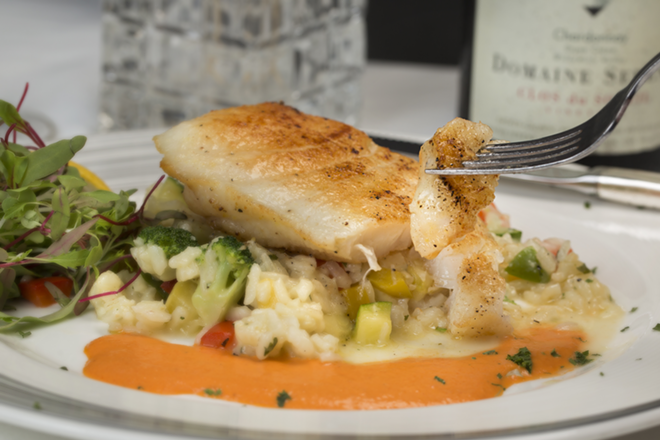Broiled halibut with vegetable-Parmesan risotto. - Chip Weiner