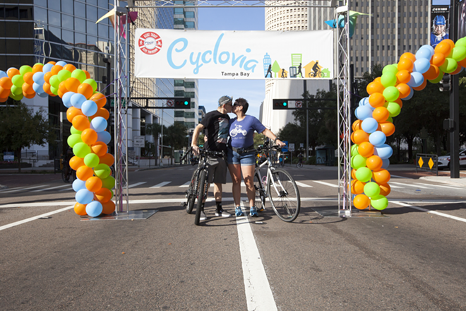 Avid cyclists, Mike & Frances Franke, show their love for Tampa's Cylovia. Cyclovia Tampa 2015. - Nicole Abbett