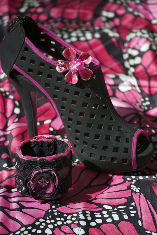 BLACK ON PINK: Artisan cuff from Tampa Artist Emporium; hot pink flower cocktail ring (on shoe) from the author’s jewelry box; Rampage shoe; Pineda Covalin mariposa scarf. - Leslie Joy Ickowitz