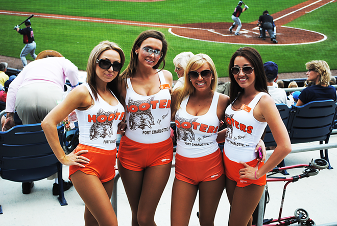 TEAM SPIRIT: The Port Charlotte Hooters girls are among the spring training attractions. - Mathias Jones