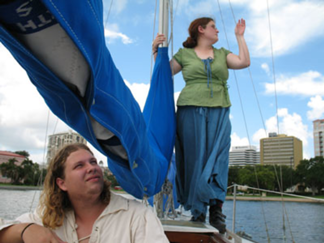 LIFE AT SEA: "The only things I'm afraid of is lightning and the Coast Guard," says Josh Collier, who lives in a 23-foot sailboat off the coast of St. Petersburg with his wife, Amber. - Alex Pickett