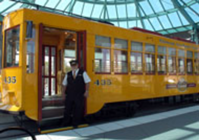 Let's, uh, roll:Conductor Robert Garcia stands in front - of the trolley. - LISA MAURIELLO