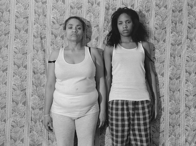 MOTHERLY LOVE: LaToya "Ruby Frazier's Momme (Floral Comforter),"  from Momme Portrait Series, 2008, - from The Notion of Family (Aperture, 2014). - © LaToya Frazier