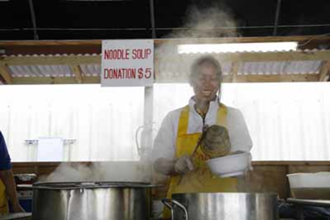 SOUP KITCHEN: Pick your meat, noodle and veggies and the volunteers do the rest. - ANDY HUSE
