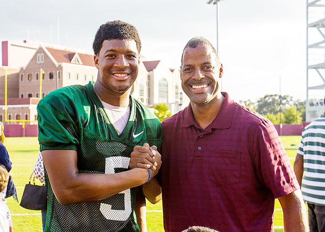 Florida State Seminoles quarterback Jameis Winston with a fan in Tallahassee in October of last year. - David July/Wikimedia Commons