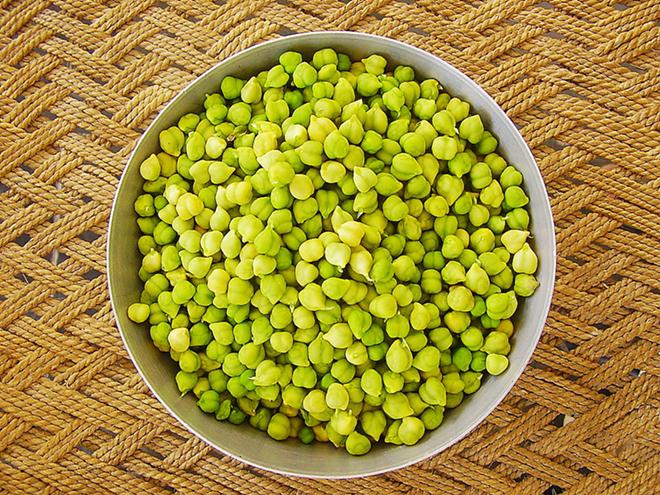 Green garbanzos are a great way to give traditional hummus a verdant makeover. - KATIE MACHOL
