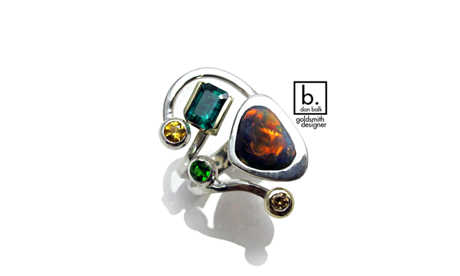 Dan Balk's contemporary ring (14k white and green gold set with an Emerald, champagne diamond, black opal, sapphire and chrome diopside) - Courtesy of Dan Balk