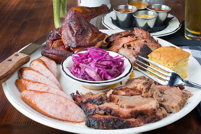 A Proper Sampler — smoked chicken, pulled pork, beef brisket and garlic sausage served with house slaw, barbecue sauces and cornbread. - Chip Weiner