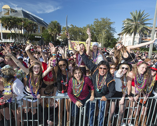 Members of last year's Gasparilla crowd, decked out in colorful beads. - CHIP WEINER