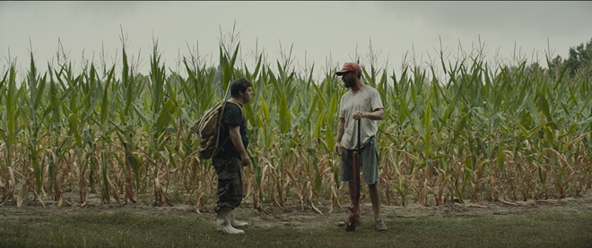 Zak (Zack Gottsagen, left) and Tyler (Shia LaBeouf) discuss the ground rules of their journey to Florida in The Peanut Butter Falcon. - Nigel Bluck/Roadside Attractions and Armory Films
